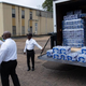 Members of Progressive Morningstar Baptist Church direct people to get bottled water following a Sunday morning service in Jackson, Mississippi, on September 4, 2022.